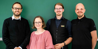 ihri group picture A picture showing the founding members of Team ihri in front of a green wall: Prof. Dr. Jens Gerken, Astrid Slojewski, Kirill Kronhardt, and Max Pascher (from left to right)